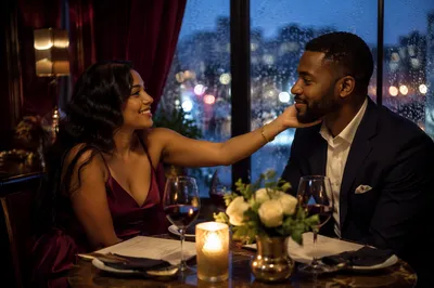 Romantic Couple Dinner by Rainy Window
