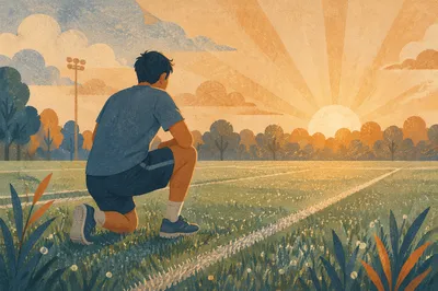 Athlete Kneeling at Sunrise on Field