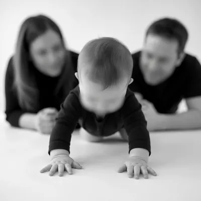 Playful Baby Crawling in Bright Studio