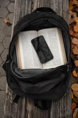Bible in Backpack on Campus Bench
