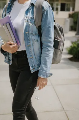 Campus Student Carrying Bible in Backpack