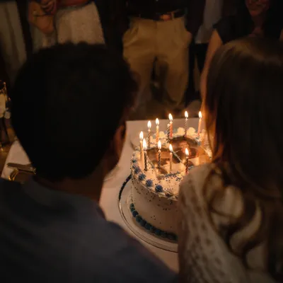 Warm Family Birthday Cake Candle Celebration