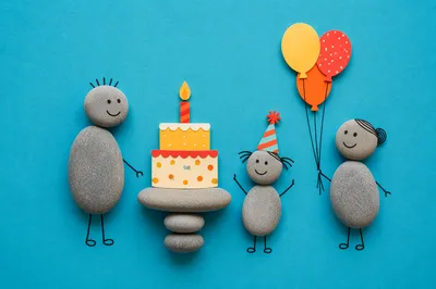 Whimsical Pebble Family Birthday Celebration Flat Lay