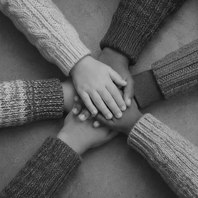 Children Hands Stacked in Teamwork