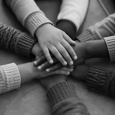 Children Hands Stacked in Teamwork