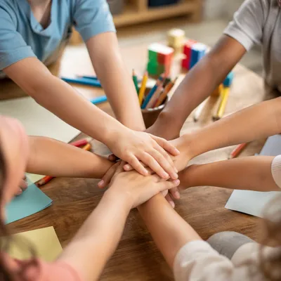 Children Hands Stacked in Friendship
