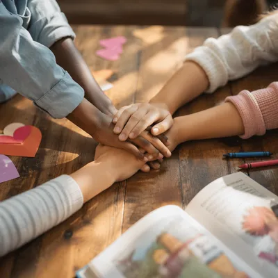 Children Hands United in Sunday Teamwork