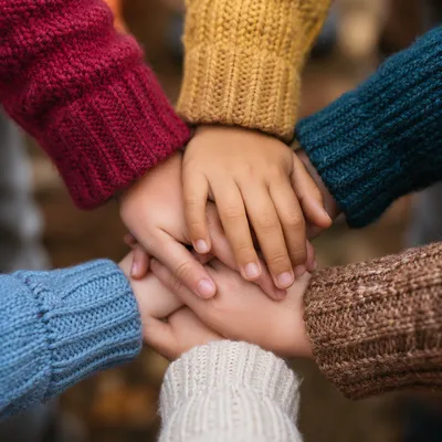 Children Hands United in Teamwork
