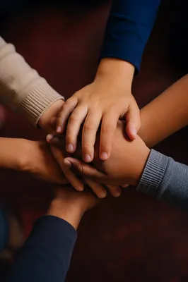 Children Hands Stacked in Teamwork