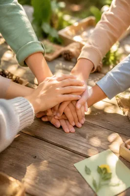 Children Stacking Hands in Garden Teamwork