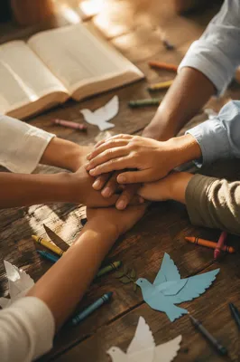 Children Stacking Hands After Sunday Craft