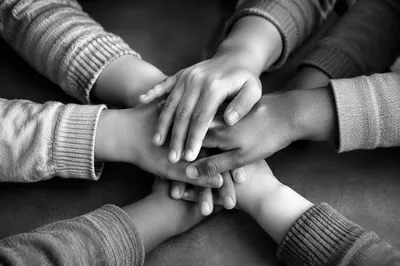 Children’s Hands United in Teamwork