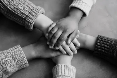 Children’s Hands Joined in Teamwork