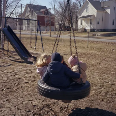 Children Playing on Neighborhood Playground