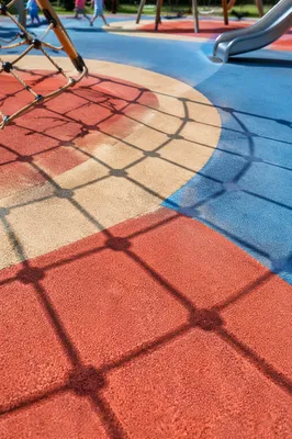 Colorful Playground Shadows and Safety Flooring