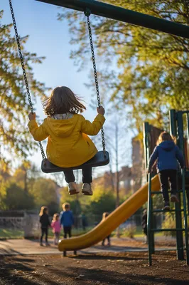 Children Playing on Sunny Neighborhood Playground