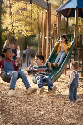 Children Playing at Autumn Playground