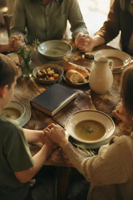 Christian Family Dinner Prayer Around Rustic Table