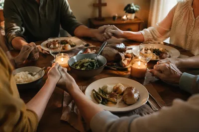Christian Family Dinner Prayer Around Warm Table