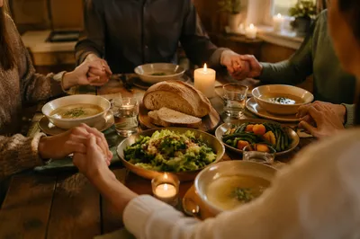 Christian Family Dinner Prayer Around Rustic Table