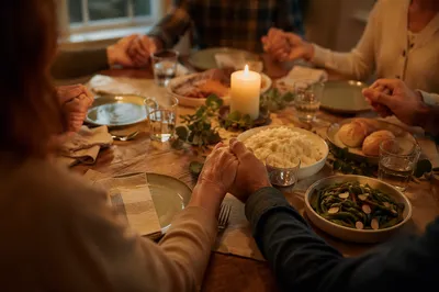 Christian Family Dinner Prayer Around Wooden Table