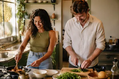 Young Couple Cooking in Bright Kitchen