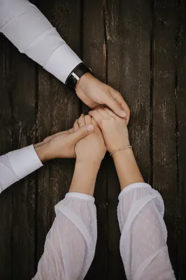 Couple Praying Hand in Hand