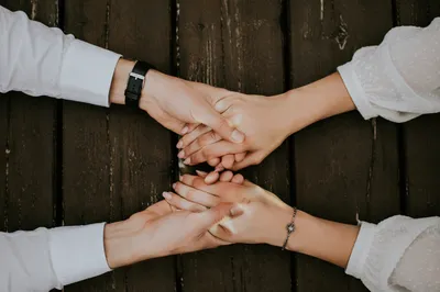 Couple Praying Hand in Hand