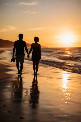 Sunset Beach Couple Walking Hand in Hand