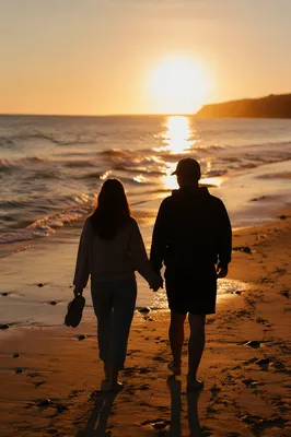 Romantic Couple Silhouette Walking Beach Sunset