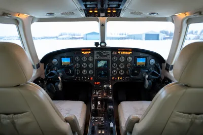 Winter Preflight Cockpit With Snowy Airfield View