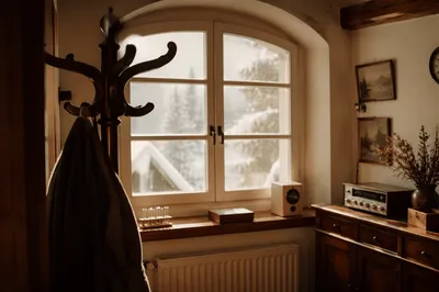Cozy Cabin Window With Snowy Morning View