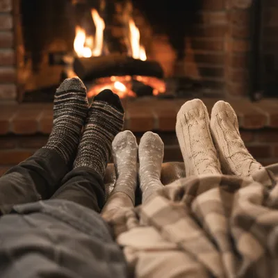 Cozy Socked Feet by Fireplace