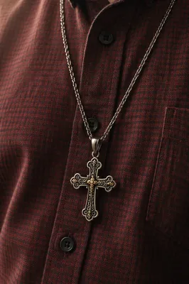 Silver Cross Necklace on Burgundy Shirt