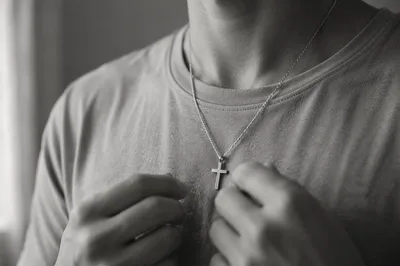 Silver Cross Necklace on Casual Shirt