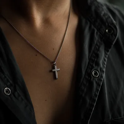 Silver Cross Pendant in Quiet Contemplation