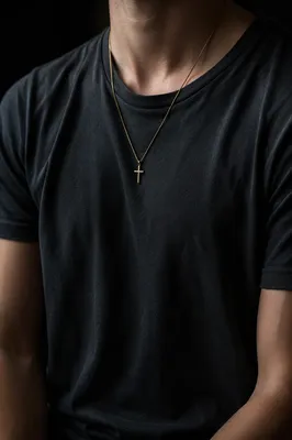 Gold Cross Necklace on Charcoal Shirt