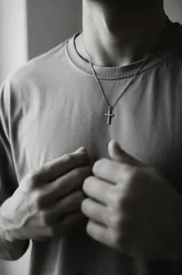 Silver Cross Necklace on Casual Shirt
