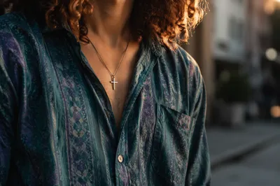Cross Necklace on Casual Teal Shirt