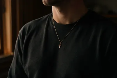 Gold Cross Necklace on Casual Shirt