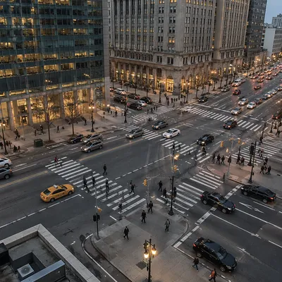 Busy Downtown Crosswalk at Dusk