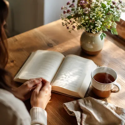 Open Book and Tea on Table