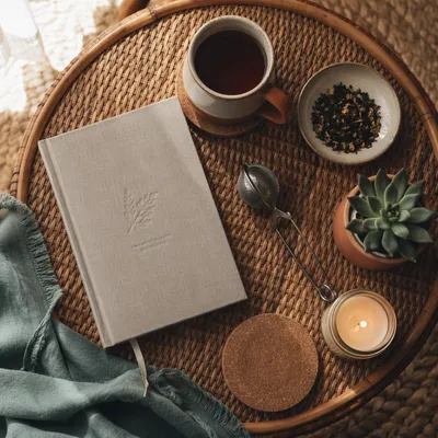 Tea Journal Flat Lay on Rattan Table