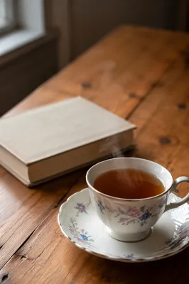 Steaming Tea Cup on Wooden Table
