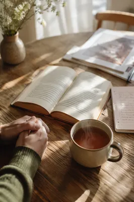 Open Book and Tea on Table