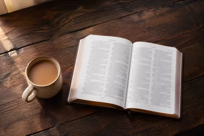 Open Book and Tea on Table