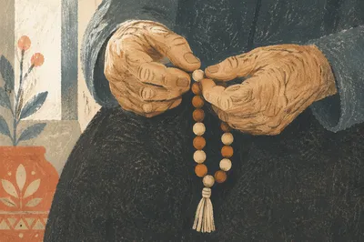 Elderly Hands Holding Rosary in Prayer