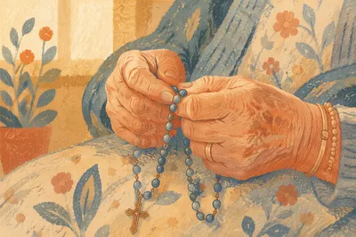 Elderly Hands Holding Rosary Beads in Prayer