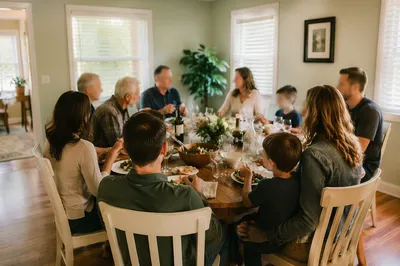 Multigenerational Family Laughing at Dinner Table
