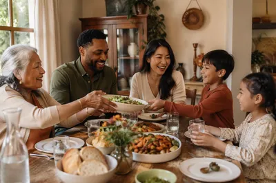 Multigenerational Family Laughing at Dinner Table